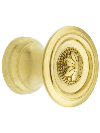 Small Flower Design Cabinet Knob - 1 inch Diameter in Unlacquered Brass.